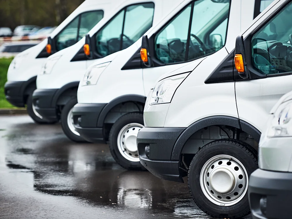 A row of commercial fleet vans